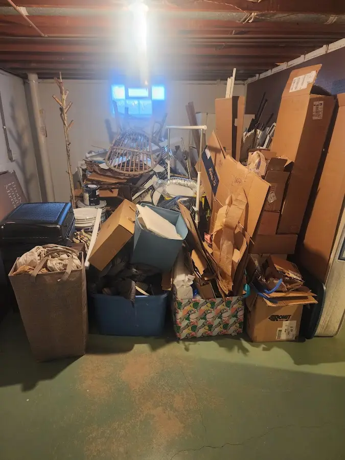 Roll-off dumpster container at job site for 2 Yard Dumpster Rental in Colorado Springs